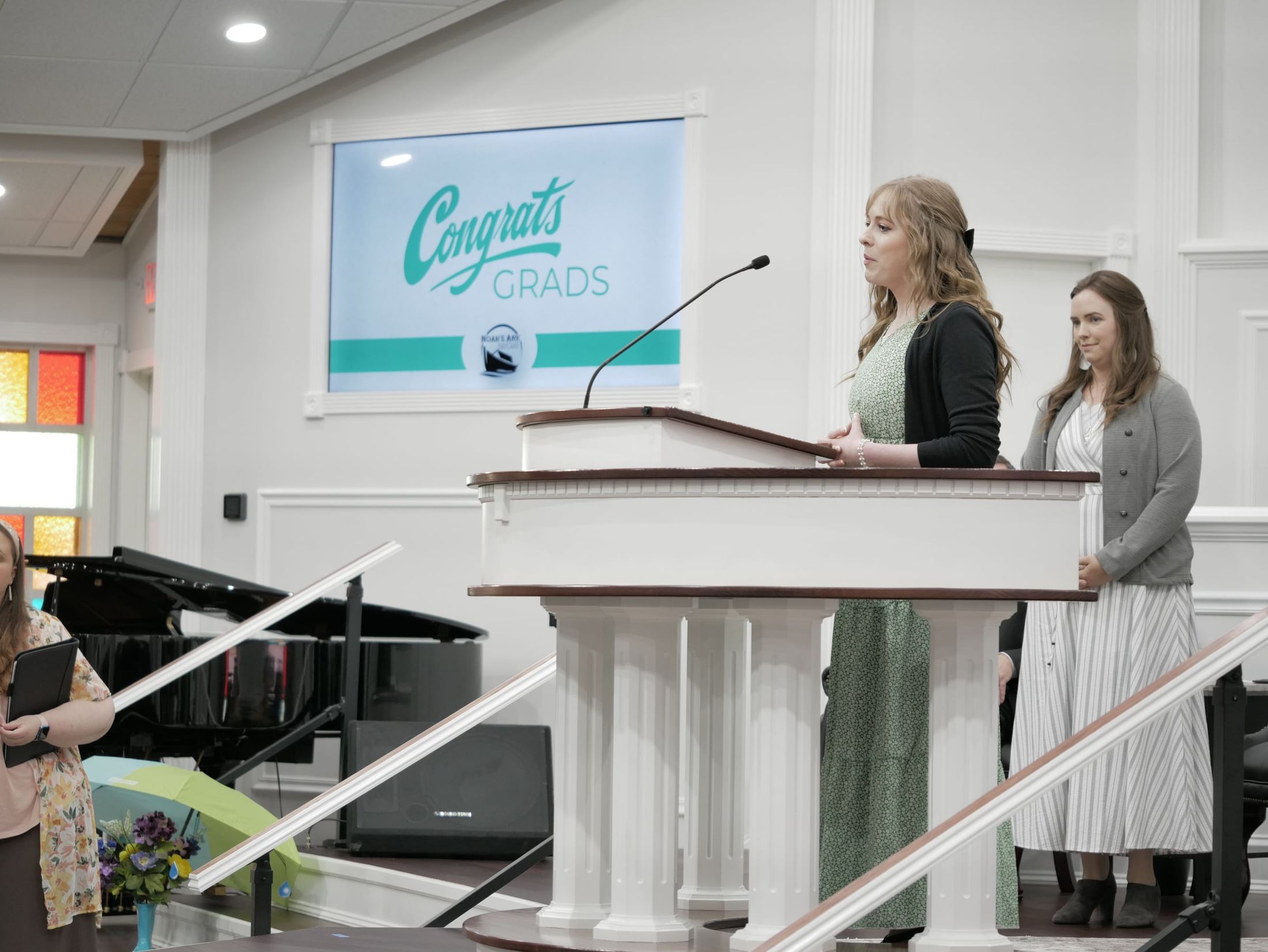 Noah's Ark Daycare staff speaking at the preschool graduation ceremony